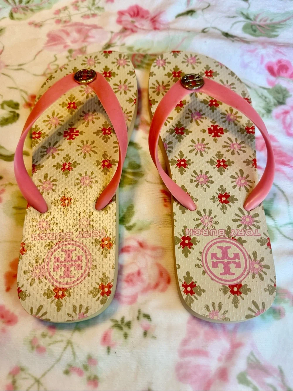 Tory Burch Pink Floral Flip Flop Sandals with Gold Logo Medallion